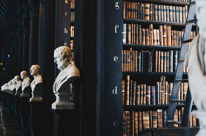 old library with statues of presidents